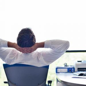 Pension solutions - Relaxed business man after planning pension