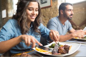 Couple eating out at a reastaurant