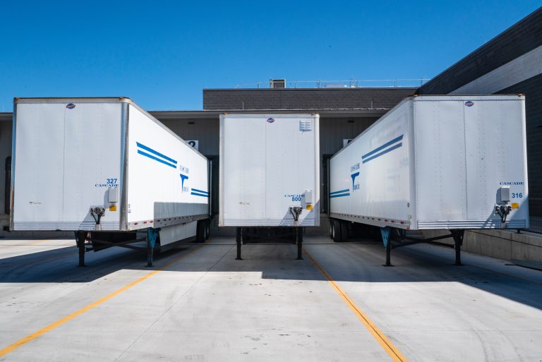 Three lorry trailer parked up